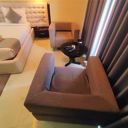 Hotel Papilio Malda Bagian luar foto